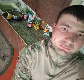 Николай